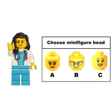 A female doctor figurine with a stethoscope.