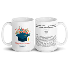 Two white mugs, one with a graduation cap design and 'Congratulations! YOU DID IT!' text, the other with thesis.